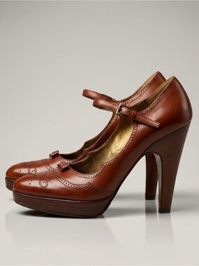 Prada Leather Mary Janes w/brogue detailing and bow, buckle, wooden heel, 37,EUC
